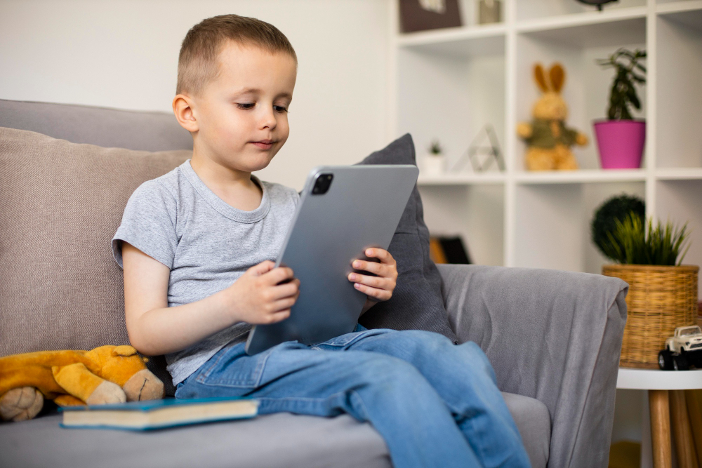 Child using ABCmouse educational app on tablet