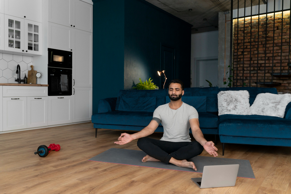 Student practicing mindfulness with a yoga mat at home